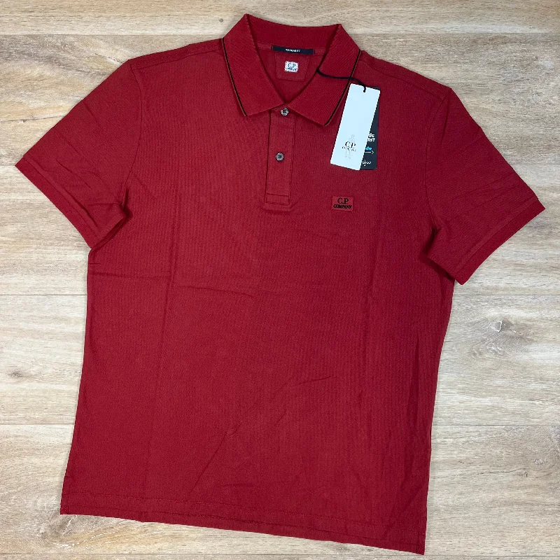 Men's ribbed cuffs and hem polo shirts for a textured lookC.P. Company Stretch Piquet Regular Polo Shirt in Ketchup