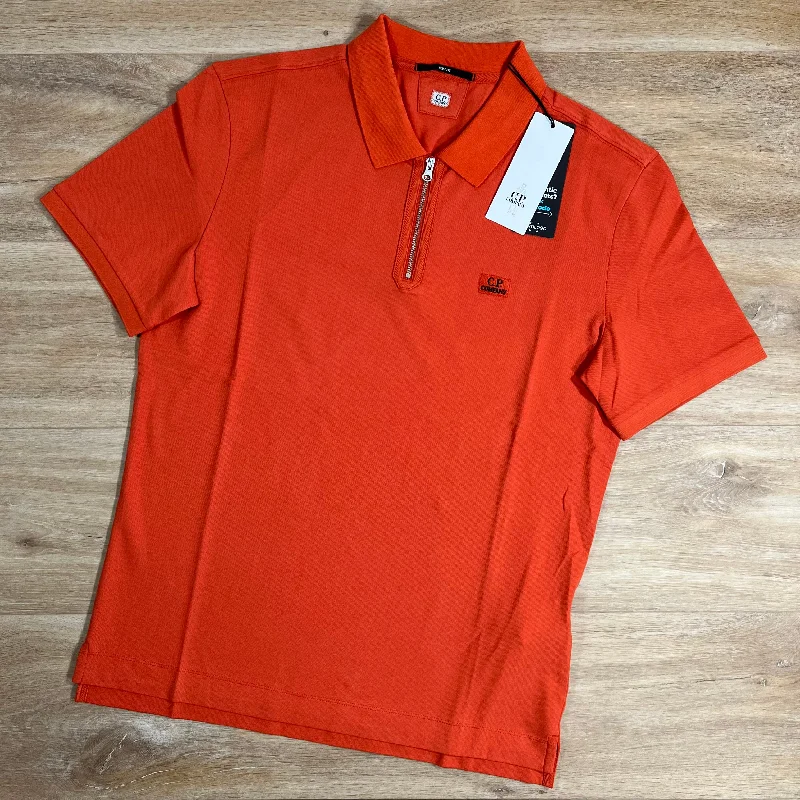 Men's jacquard woven polo shirts with intricate designsC.P. Company Stretch Piquet Zip Polo Shirt in Pumpkin