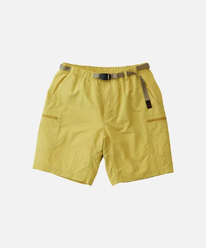 Men's ripped denim shorts for a trendy streetwear aesthetic   Men's Nylon Utility Short In Canary Yellow